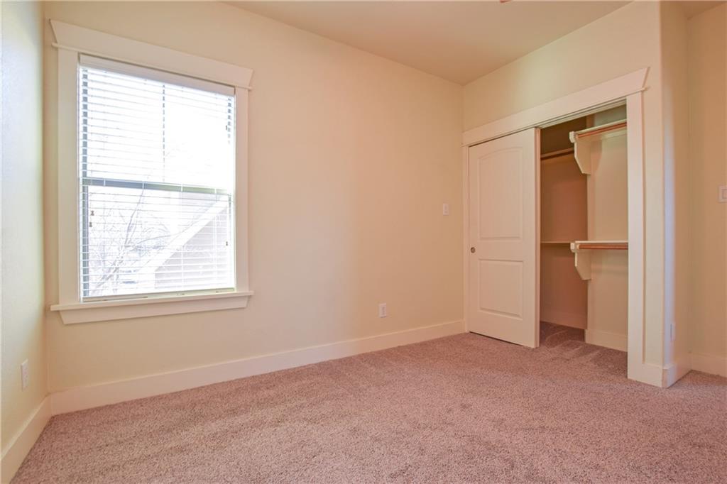 5405 Avenue H, Unit B Austin, TX 78751 - Photo 8 of 13 an empty room with windows