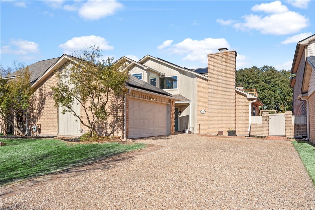 2910 Broadmoor Drive Bryan, TX 77802 - Photo 1 of 1 View of front of home featuring a garage and a fro