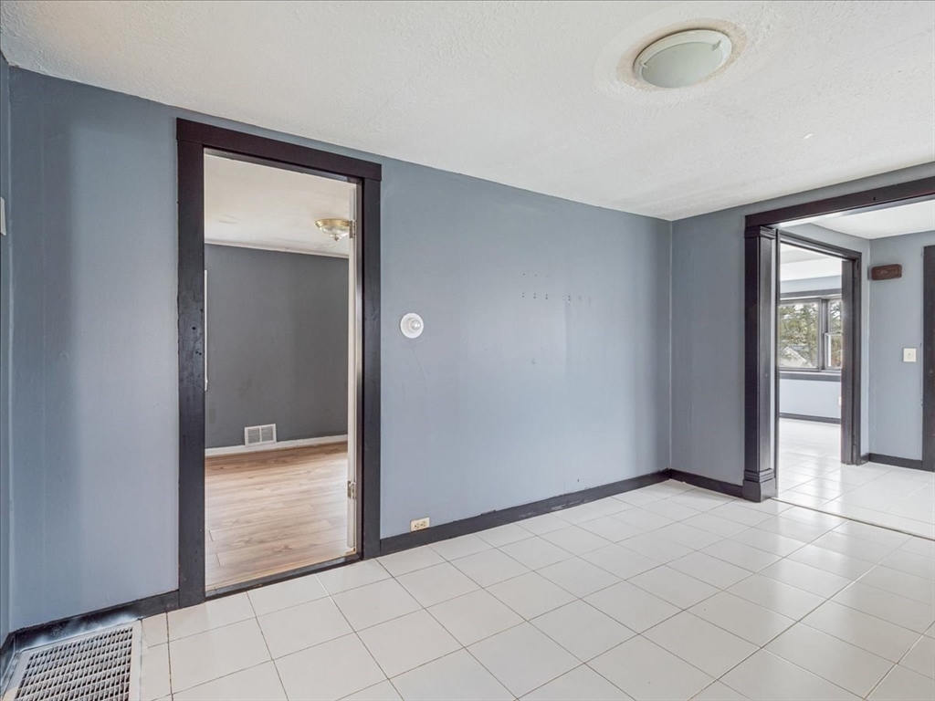 10 East Shore Road Holbrook, MA 02343 - Photo 11 of 30 an empty room with mirror