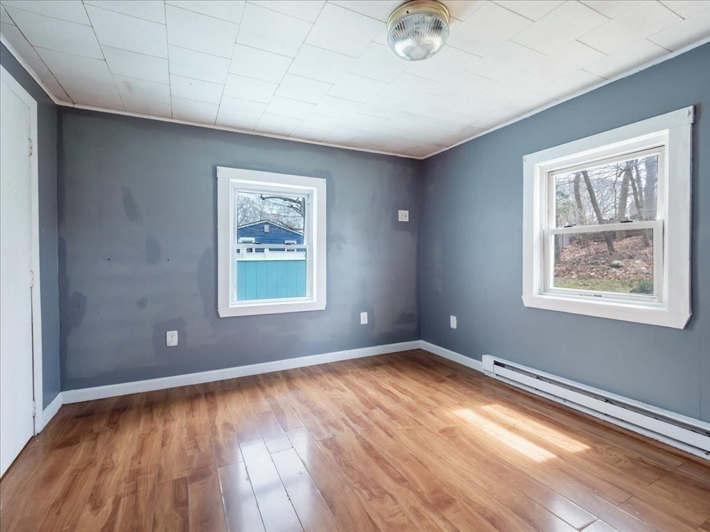 10 East Shore Road Holbrook, MA 02343 - Photo 17 of 30 a view of room with window and wooden floor