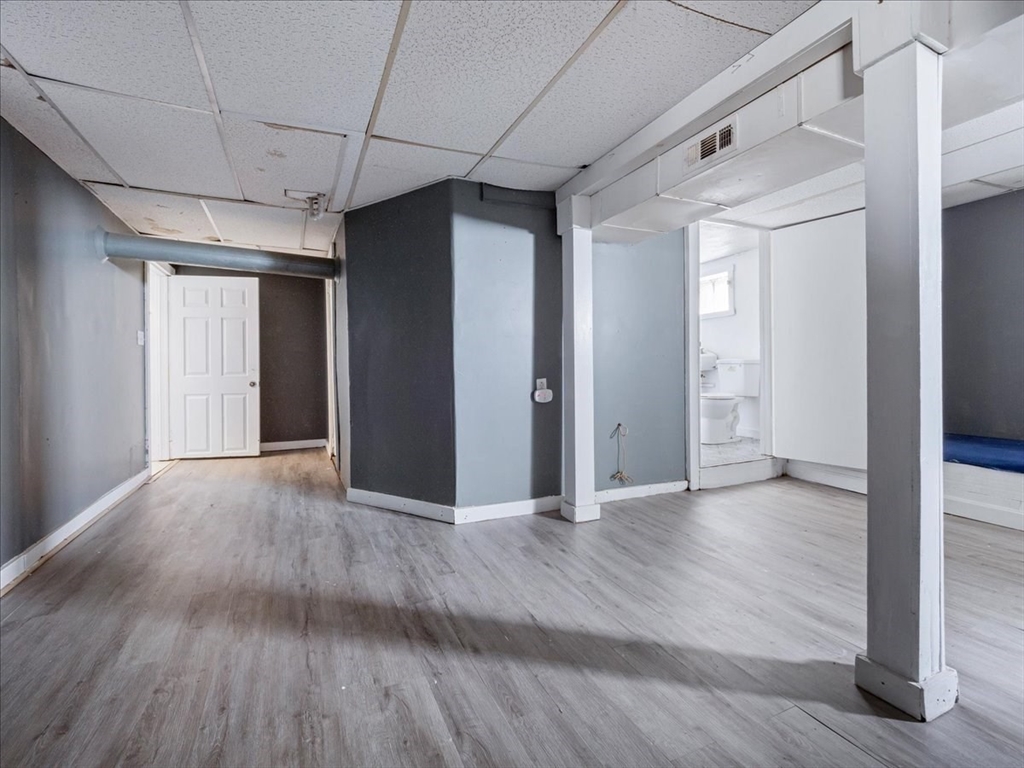 10 East Shore Road Holbrook, MA 02343 - Photo 23 of 30 a view of an empty room with wooden floor