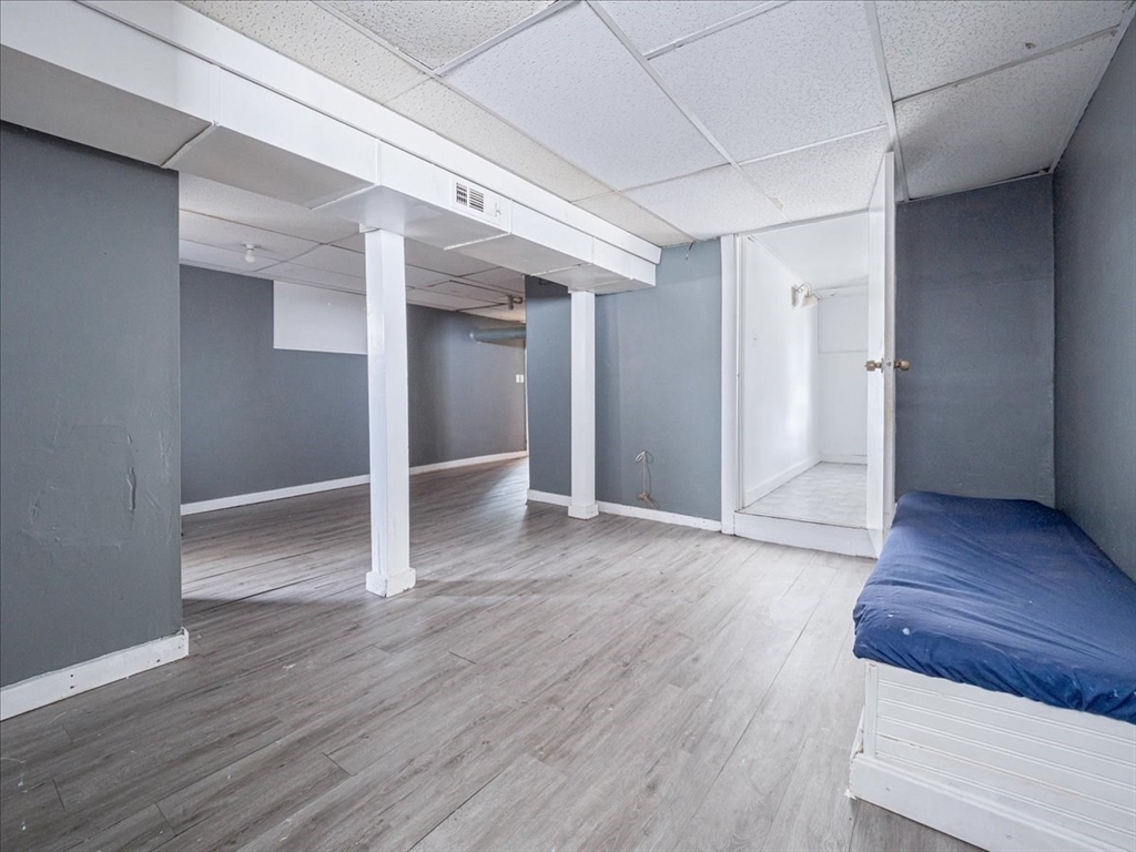 10 East Shore Road Holbrook, MA 02343 - Photo 24 of 30 a view of an empty room with wooden floor