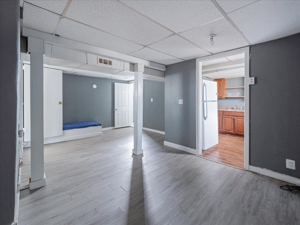 10 East Shore Road Holbrook, MA 02343 - Photo 25 of 30 an empty room with wooden floor & closet and windows