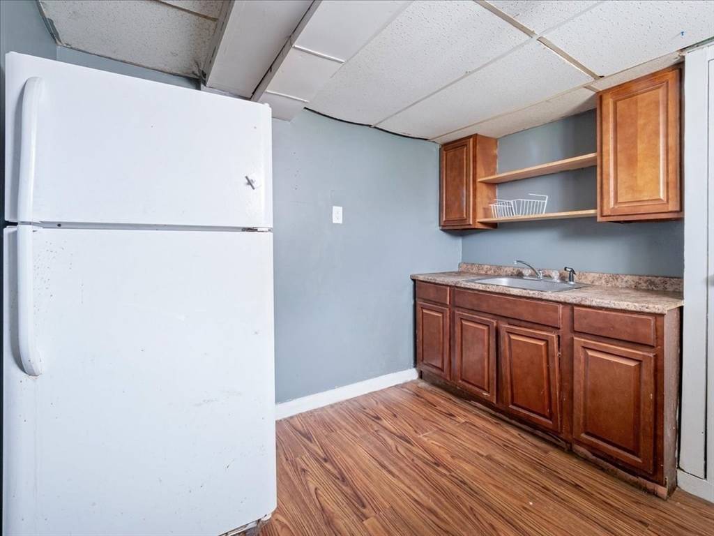 10 East Shore Road Holbrook, MA 02343 - Photo 26 of 30 a kitchen with stainless steel appliances granite countertop a refrigerator and a stove top oven