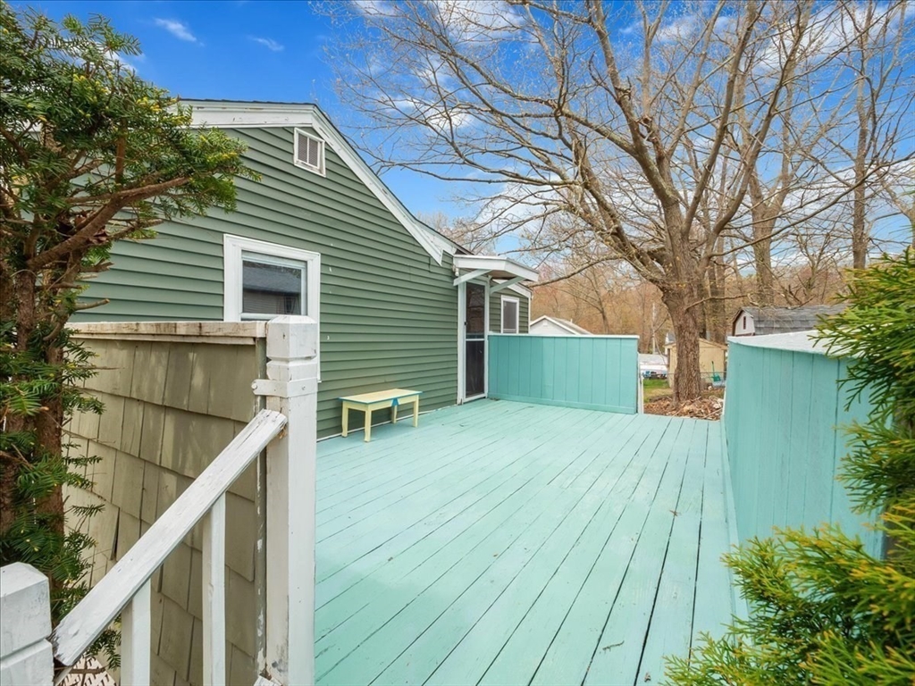 10 East Shore Road Holbrook, MA 02343 - Photo 5 of 30 a backyard of a house with wooden deck and furniture