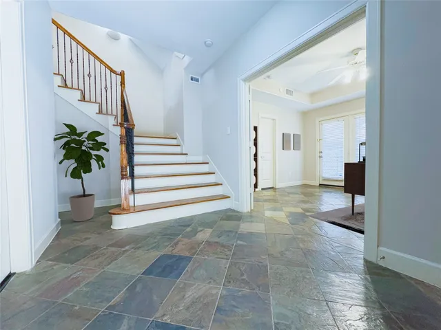a view of entryway with livingroom and hallway