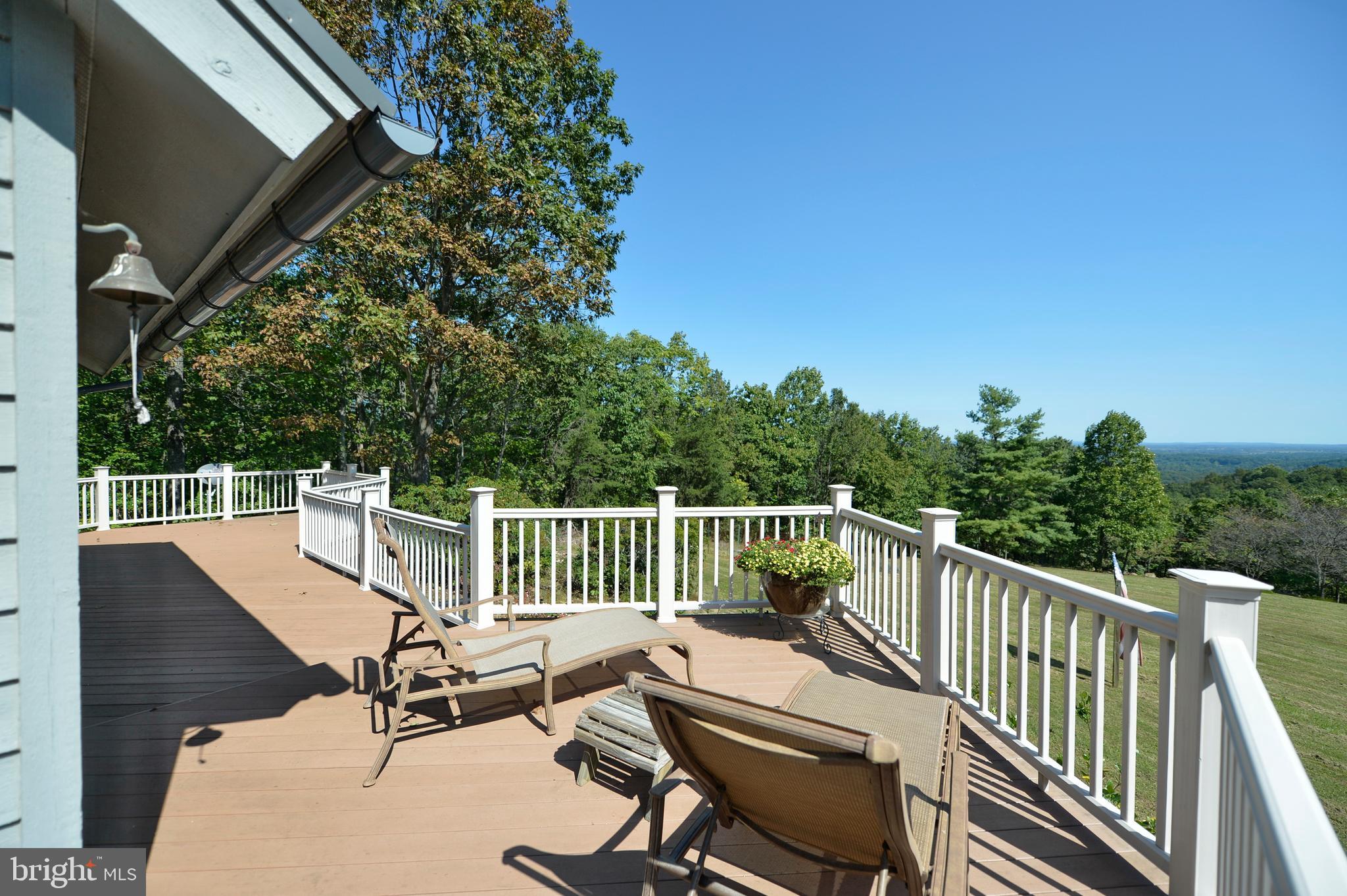 11173 Oakview Road Delaplane, VA 20144 - Photo 13 of 60 Expansive deck wraps around the side and back