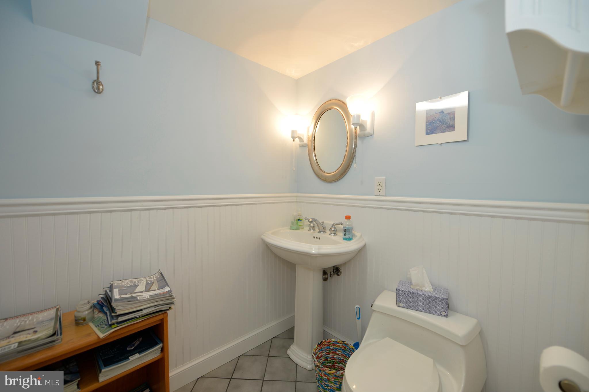 11173 Oakview Road Delaplane, VA 20144 - Photo 48 of 60 Lower level 1/2 bath, wainscotting, &tile floor