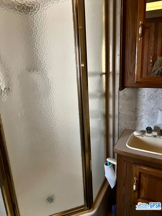 70201 Aurora Road Desert Hot Springs, CA 92241 - Photo 12 of 18 a bathroom with a sink