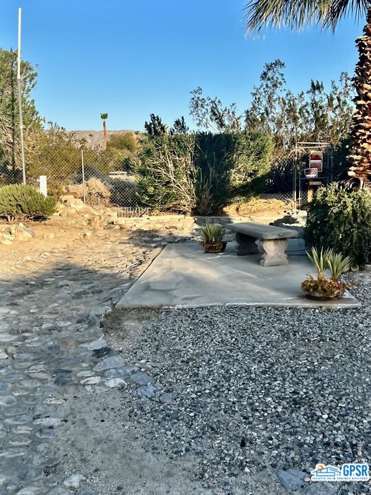 70201 Aurora Road Desert Hot Springs, CA 92241 - Photo 17 of 18 a view of a backyard of the house