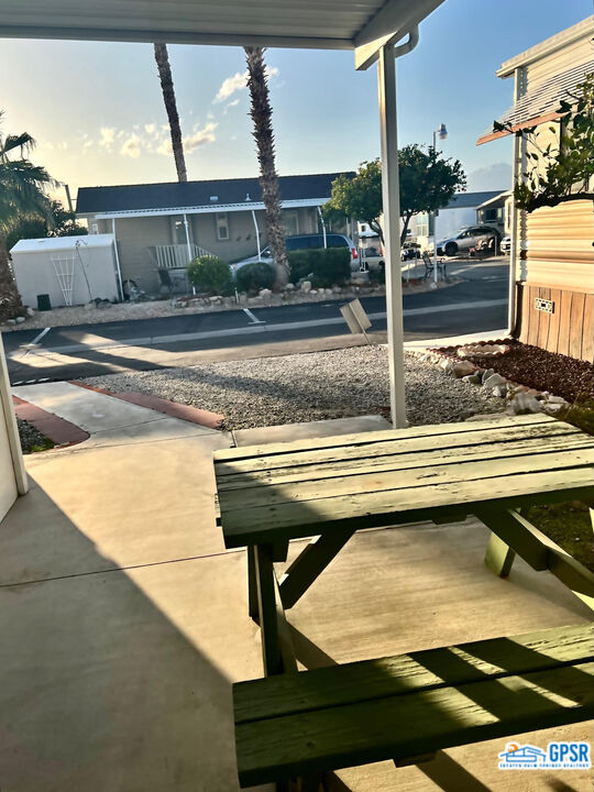 70201 Aurora Road Desert Hot Springs, CA 92241 - Photo 3 of 18 a view of a swimming pool with a lounge chairs
