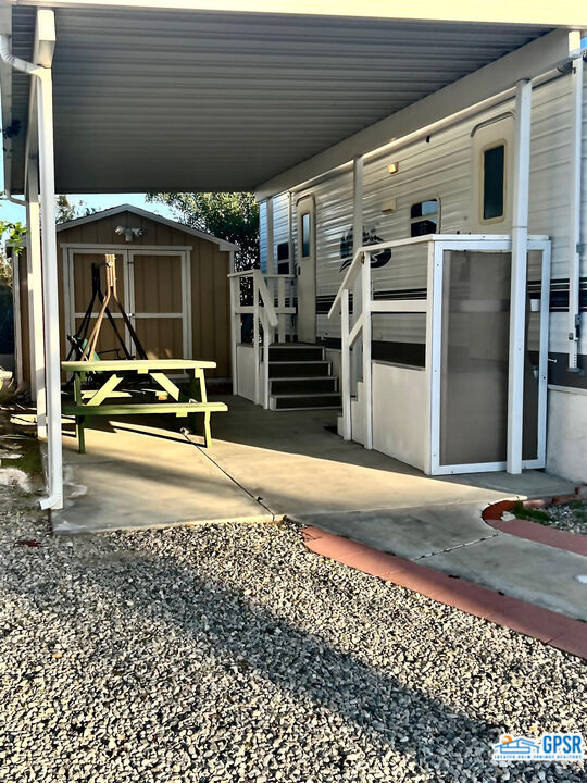 70201 Aurora Road Desert Hot Springs, CA 92241 - Photo 4 of 18 a view of a building with storage space