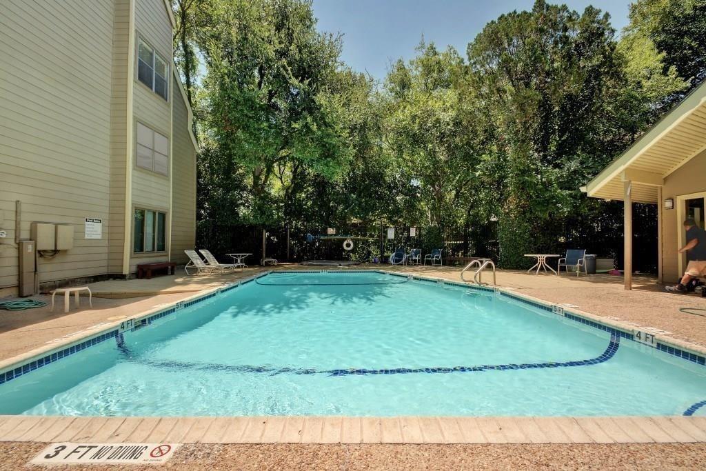 1135 Barton Hills Drive, Unit 252 Austin, TX 78704 - Photo 16 of 19 Community pool featuring a patio area