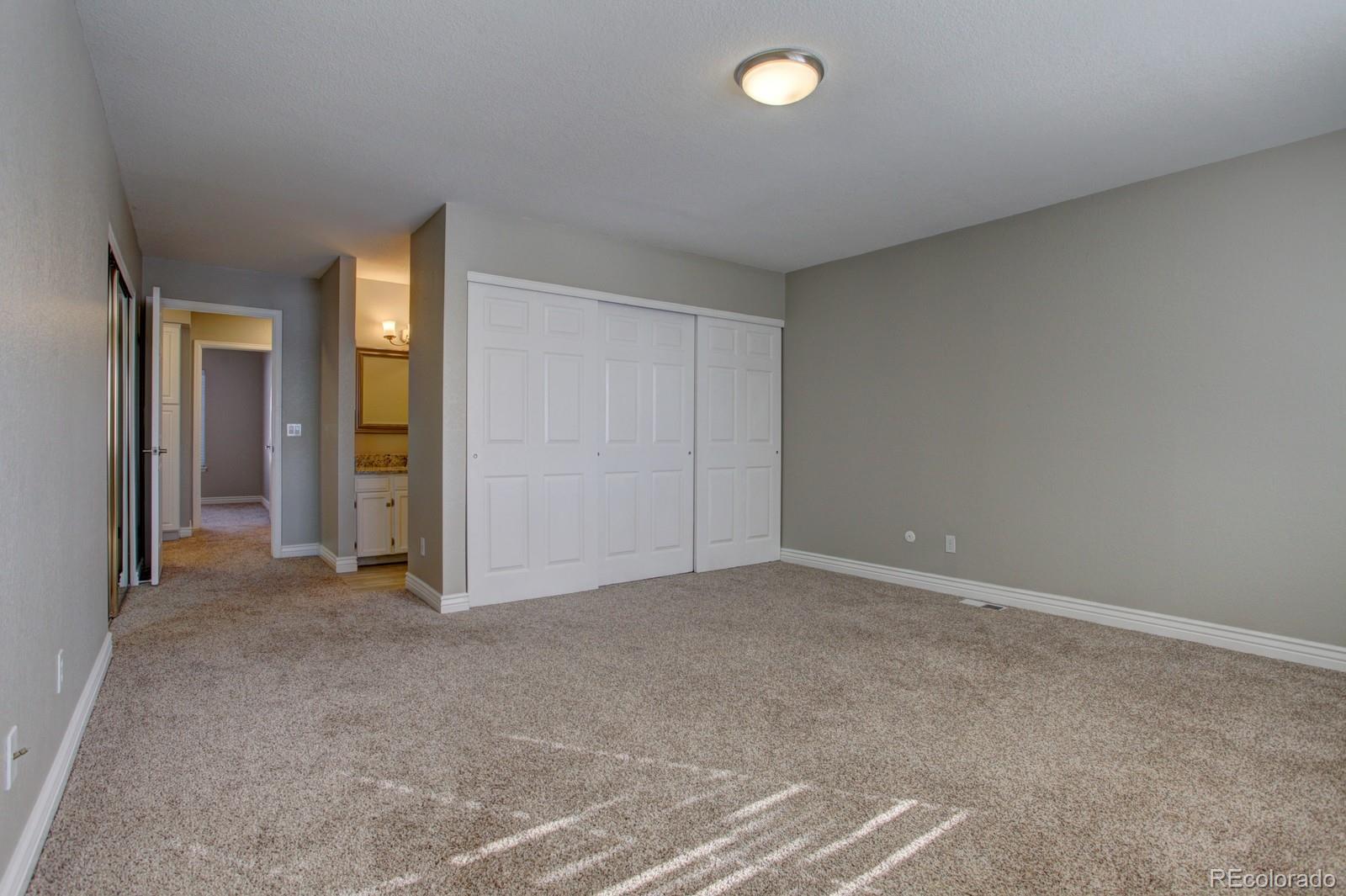 63 Prairie Ridge Road Highlands Ranch, CO 80126 - Photo 13 of 29 an empty room with closet area