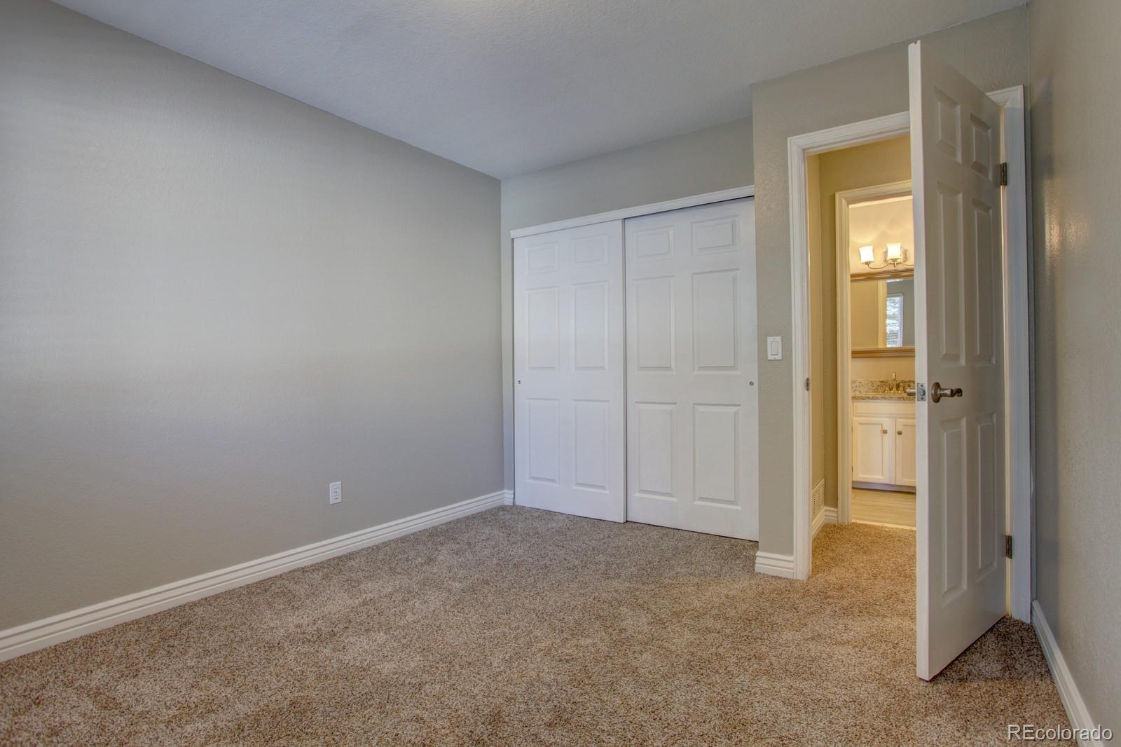63 Prairie Ridge Road Highlands Ranch, CO 80126 - Photo 16 of 29 a view of an empty room and closet area