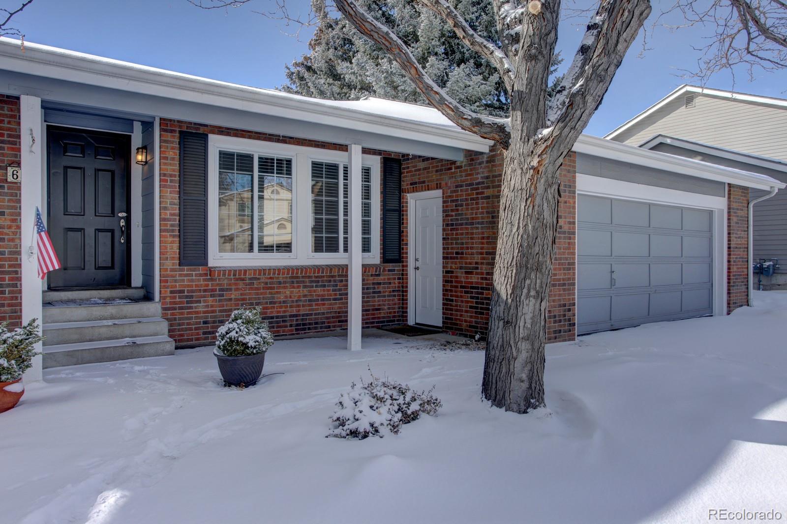 63 Prairie Ridge Road Highlands Ranch, CO 80126 - Photo 2 of 29 a front view of a house with chairs