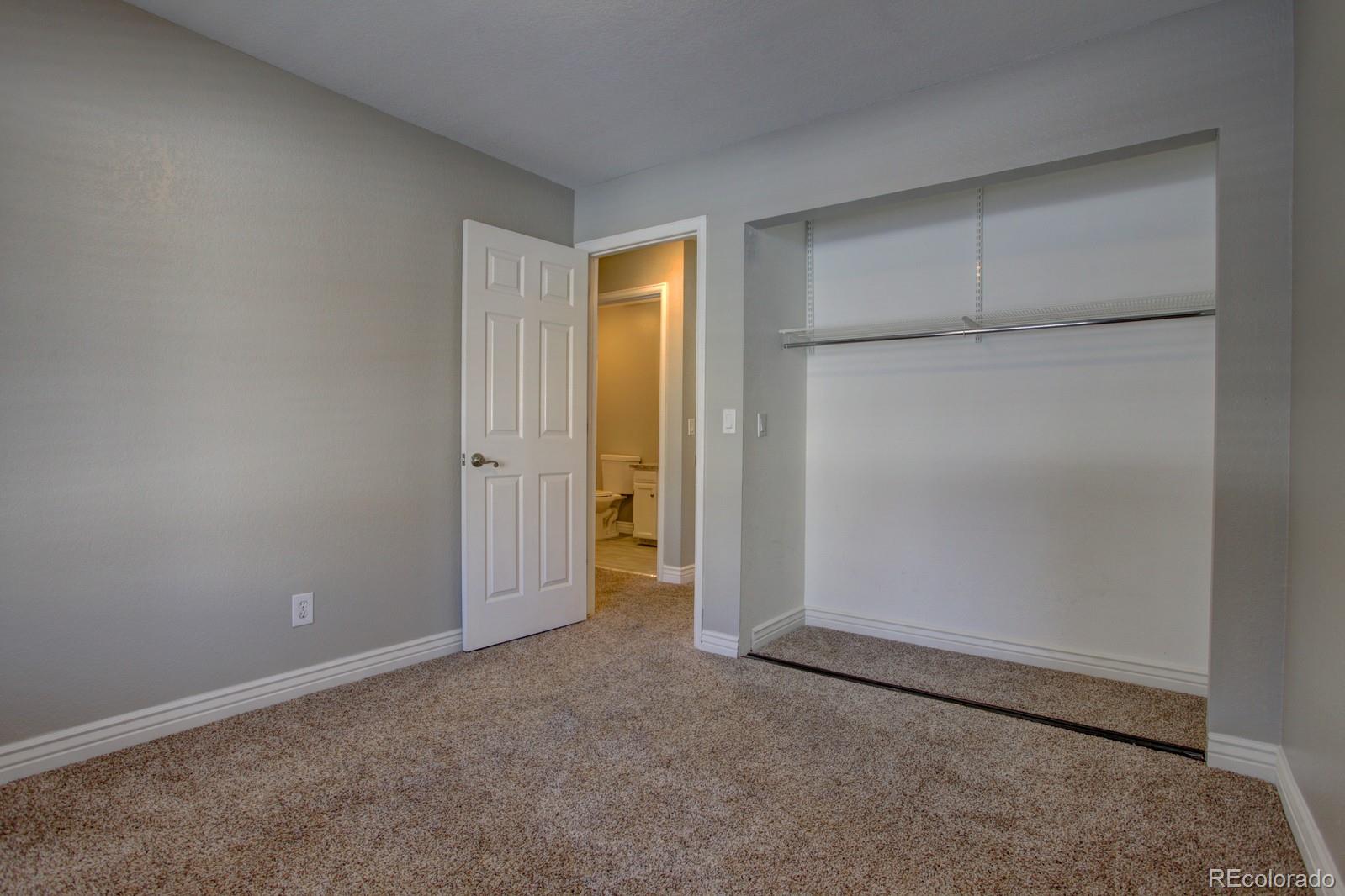 63 Prairie Ridge Road Highlands Ranch, CO 80126 - Photo 10 of 29 an empty room with closet area