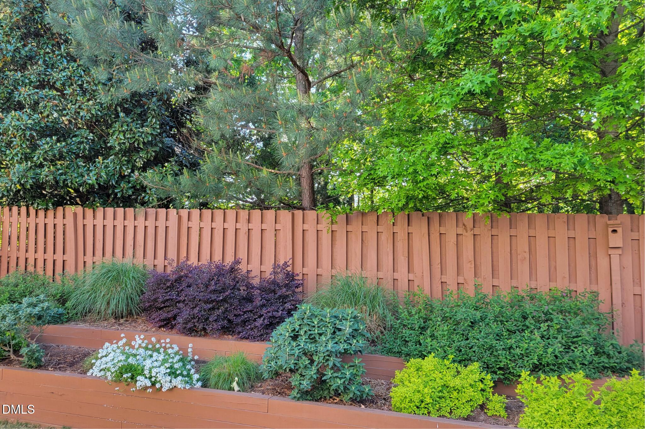 2844 Bogle Branch Court Raleigh, NC 27606 - Photo 46 of 54 Seller Photo: Backyard in Bloom