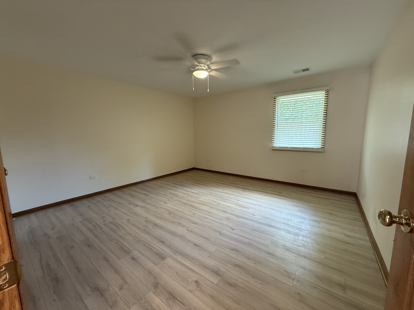 532 West Street, Unit 6 Lockport, IL 60441 - Photo 11 of 13 wooden floor in an empty room with a window