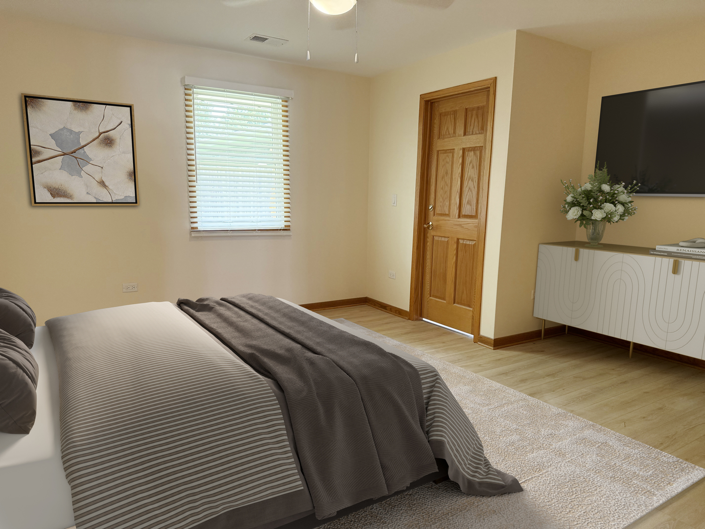 532 West Street, Unit 6 Lockport, IL 60441 - Photo 12 of 13 a bedroom with a bed and a flat screen tv
