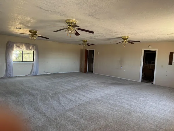 a view of a livingroom with a fireplace