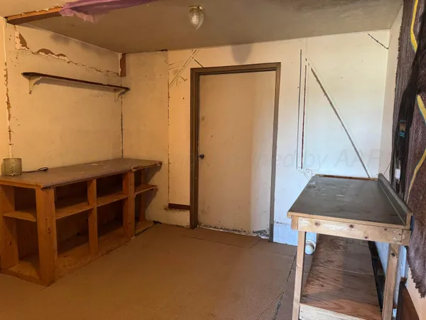 a room with furniture and a window