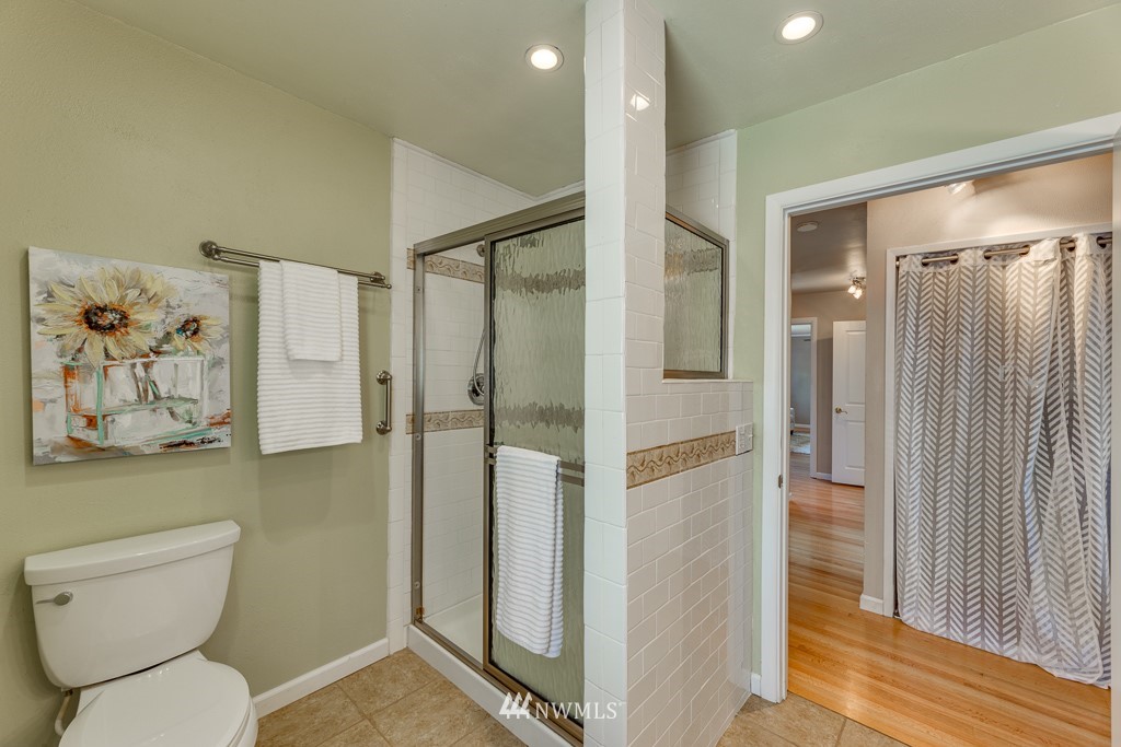 822 Rucker Avenue Everett, WA 98201 - Photo 17 of 40 a bathroom with a toilet and a shower