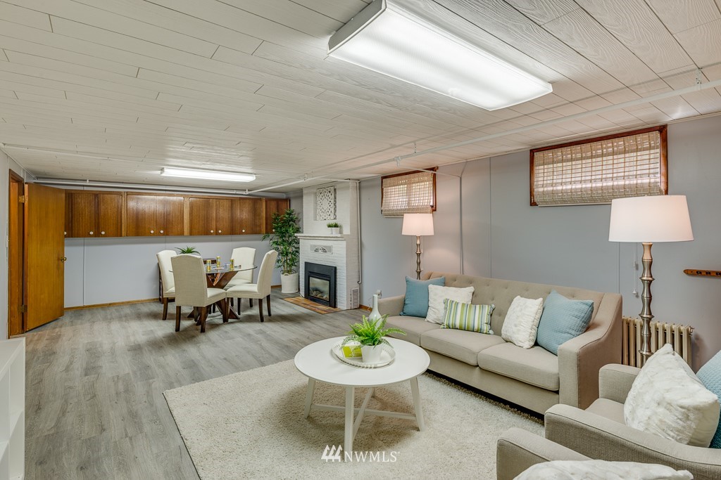 822 Rucker Avenue Everett, WA 98201 - Photo 23 of 40 a living room with furniture and a table