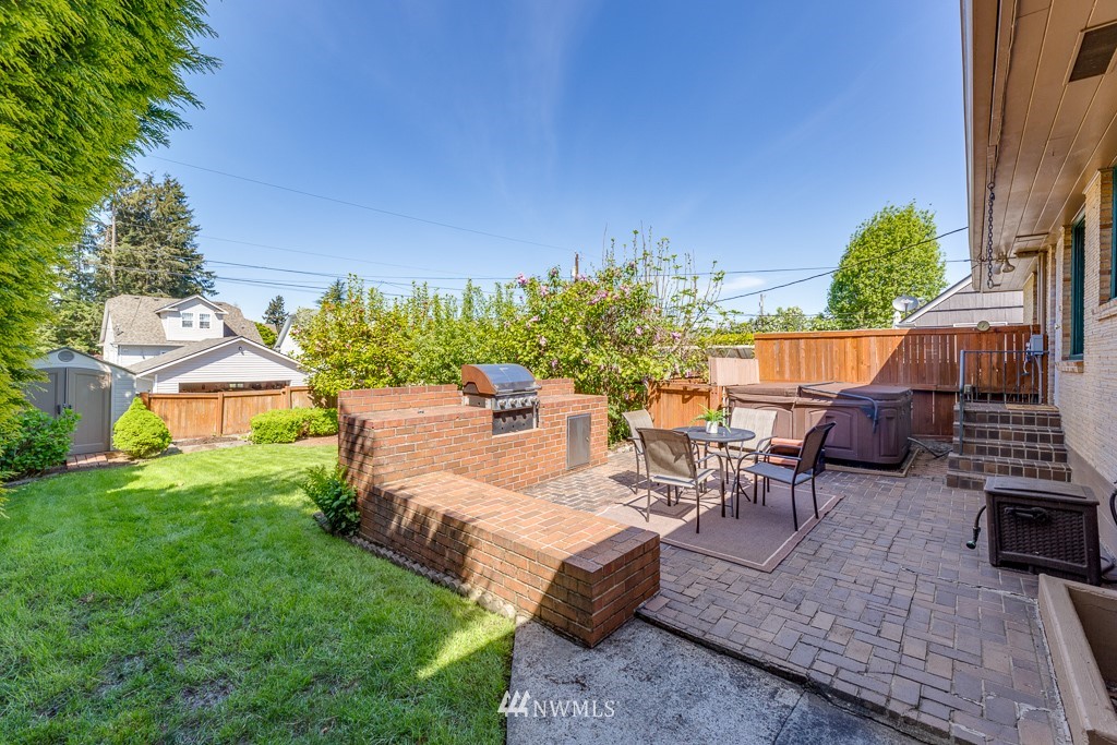 822 Rucker Avenue Everett, WA 98201 - Photo 27 of 40 a view of a backyard with sitting area