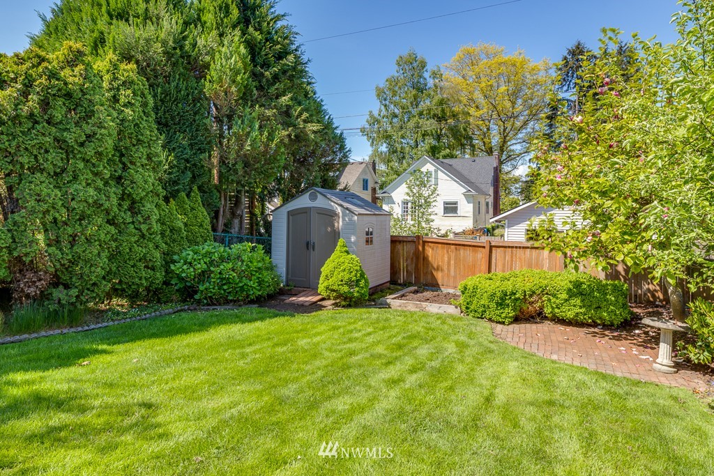 822 Rucker Avenue Everett, WA 98201 - Photo 30 of 40 a view of a house with backyard and tree