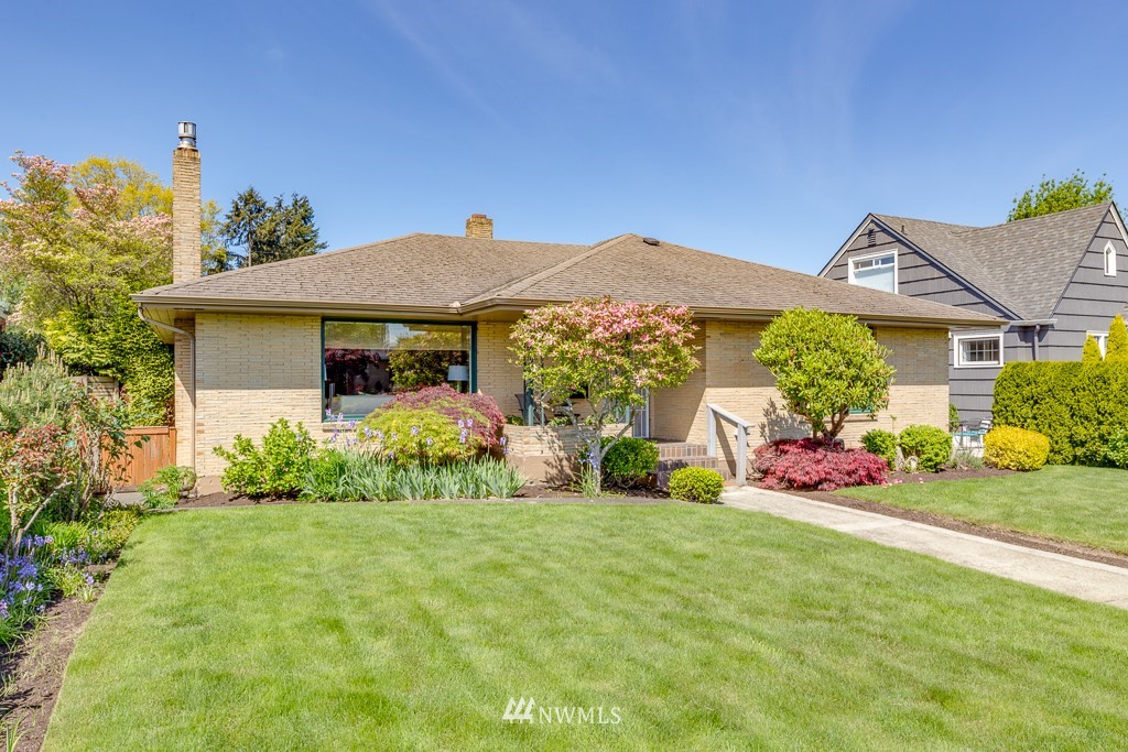 822 Rucker Avenue Everett, WA 98201 - Photo 38 of 40 a front view of a house with garden