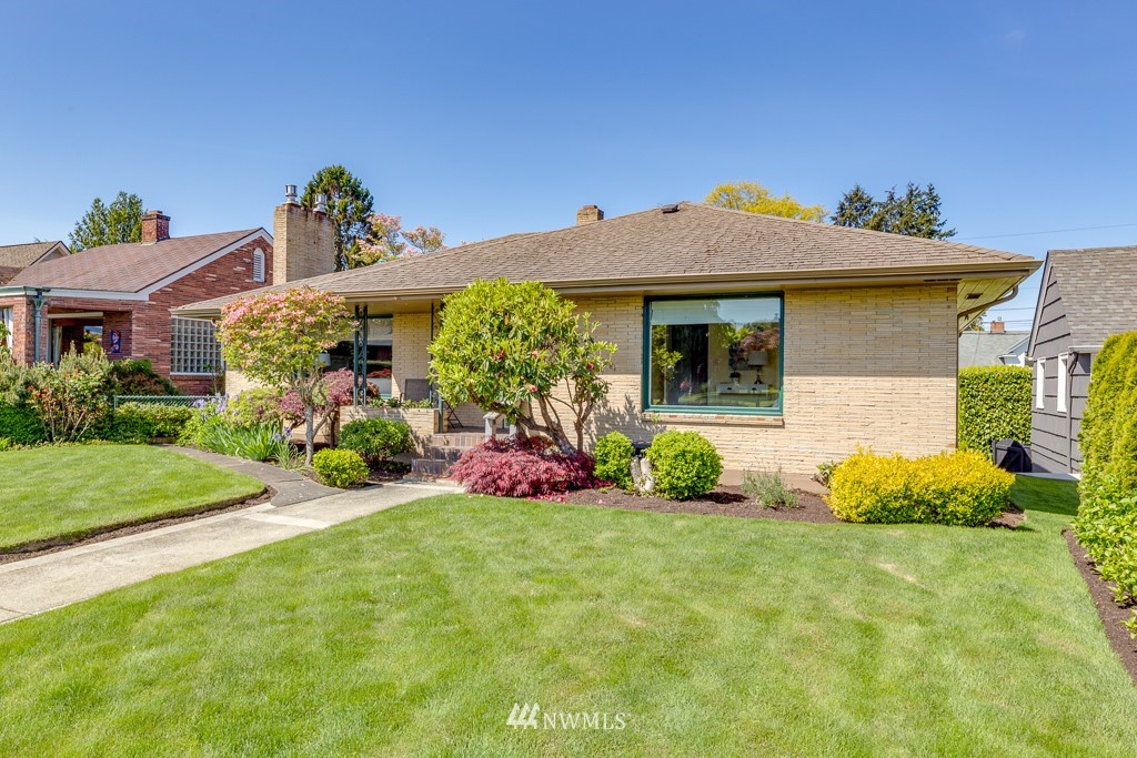 822 Rucker Avenue Everett, WA 98201 - Photo 39 of 40 a front view of a house with garden