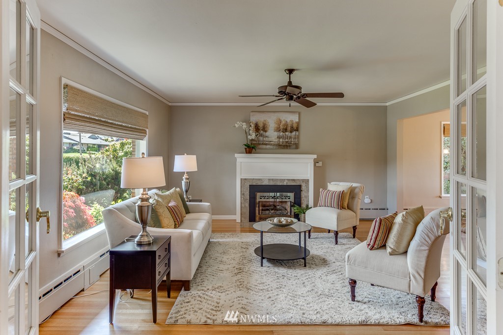 822 Rucker Avenue Everett, WA 98201 - Photo 6 of 40 a living room with furniture and a fireplace