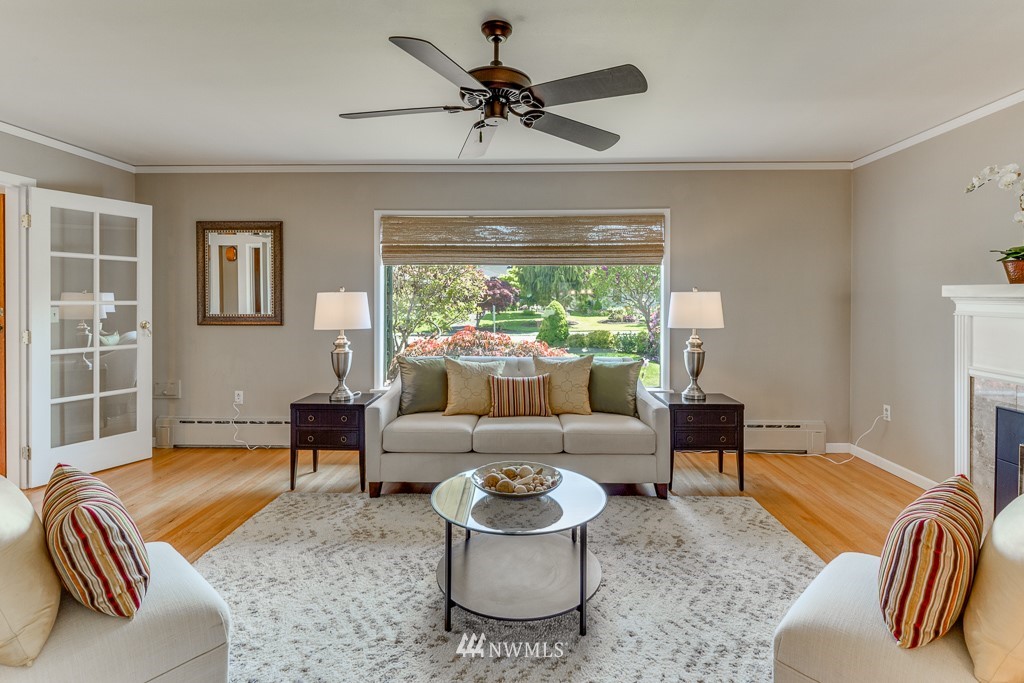 822 Rucker Avenue Everett, WA 98201 - Photo 8 of 40 a living room with furniture and a large window