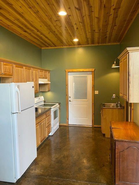 2407 Eastbrook Road New Castle, PA 16105 - Photo 13 of 17 a kitchen with a refrigerator sink stove and microwave