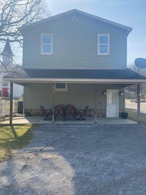 2407 Eastbrook Road New Castle, PA 16105 - Photo 2 of 17 a view of a house with a patio and a yard
