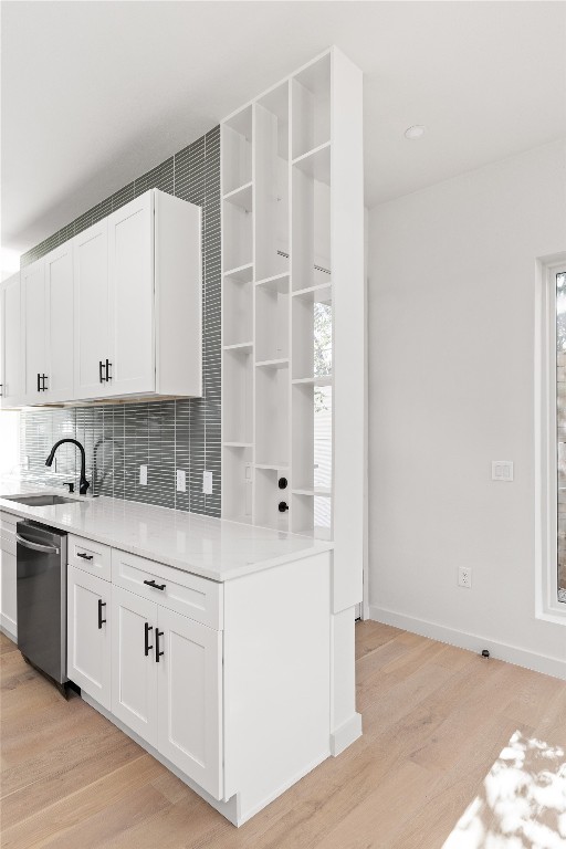 613 Clifford Drive, Unit A & B Austin, TX 78745 - Photo 13 of 40 a kitchen with stainless steel appliances a sink stove and cabinets