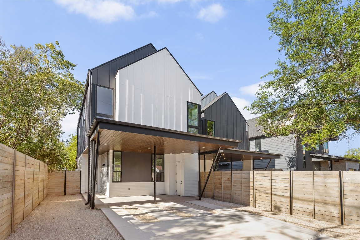 613 Clifford Drive, Unit A & B Austin, TX 78745 - Photo 2 of 40 a front view of a house with a garage