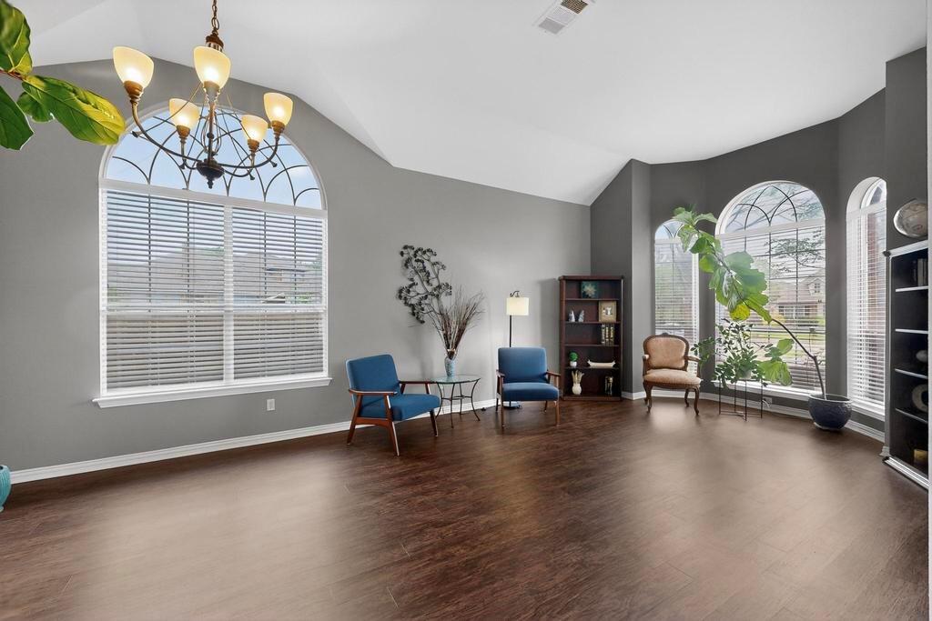 236 Hope Circle Murphy, TX 75094 - Photo 4 of 38 Formal living room with lofted ceiling, wood-like LVP floors