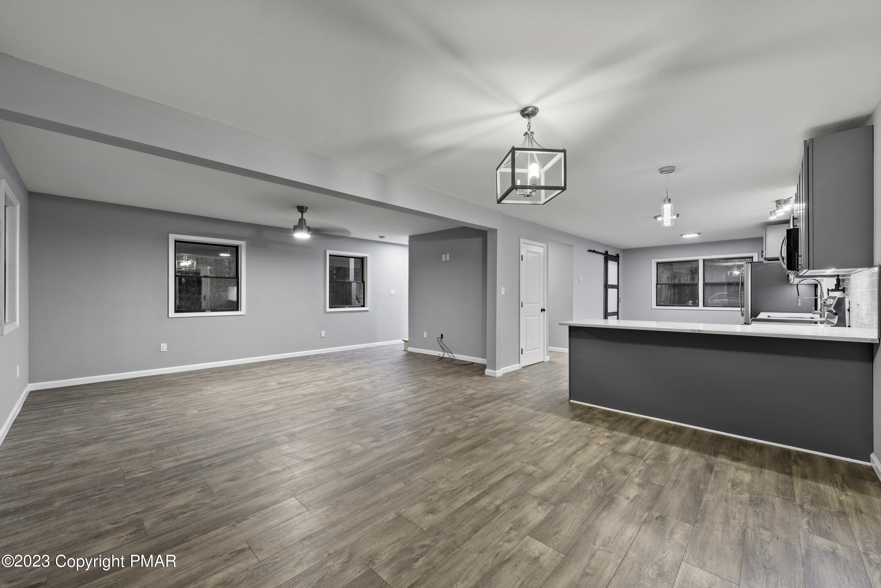152 Turkey Ridge Kunkletown, PA 18058 - Photo 8 of 35 a view of a kitchen with center island and wooden floor