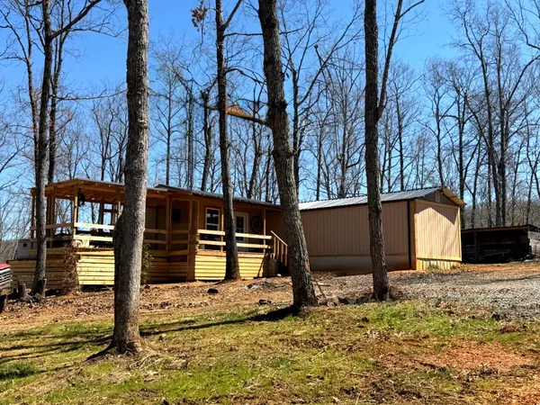 a view of a house with snow on the wall