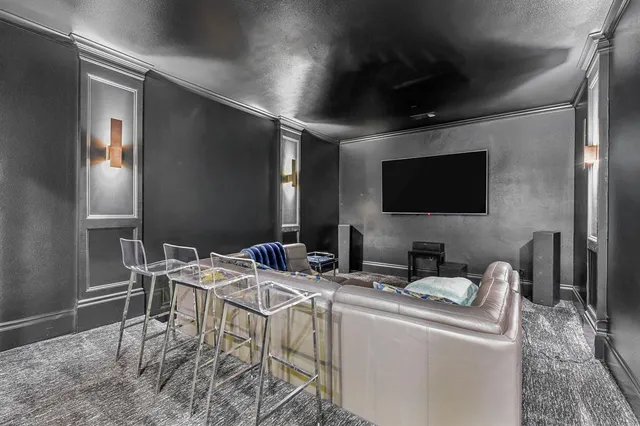 a view of kitchen with stainless steel appliances granite countertop cabinets and refrigerator