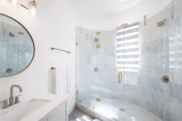 a view of a house with a big yard and potted plants