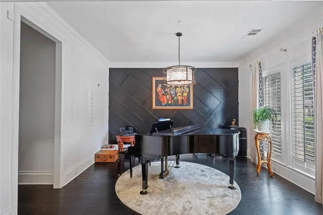 a workspace with furniture window and wooden floor