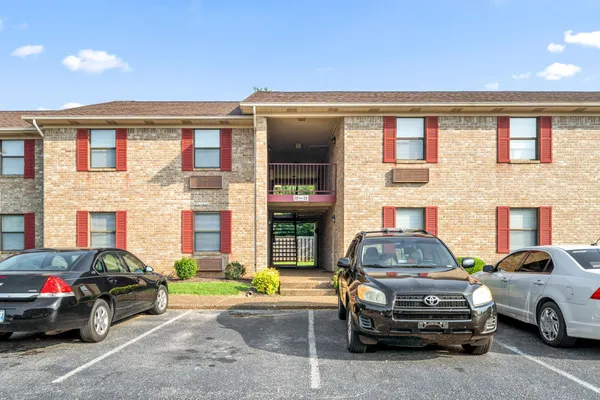 a car parked in front of a house