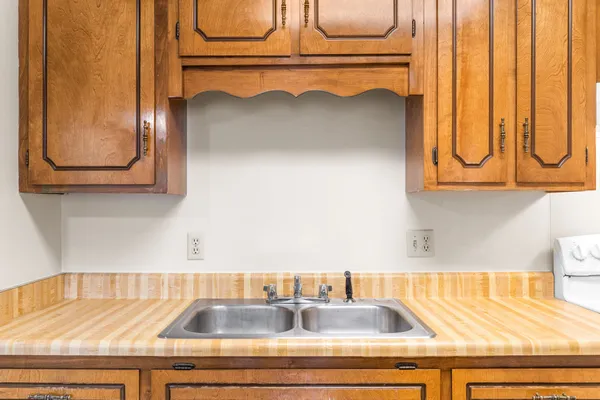 a kitchen sink with a stove