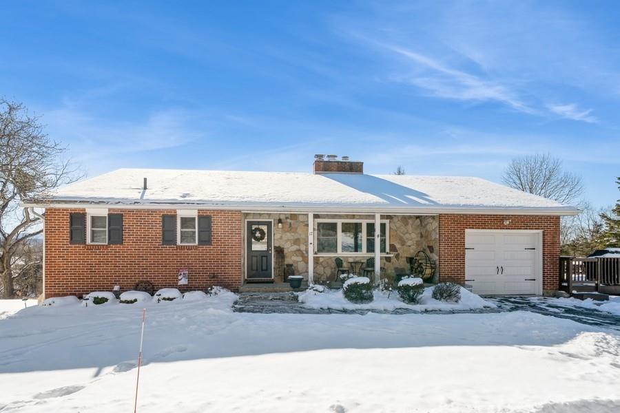 Ranch-style house featuring a garage