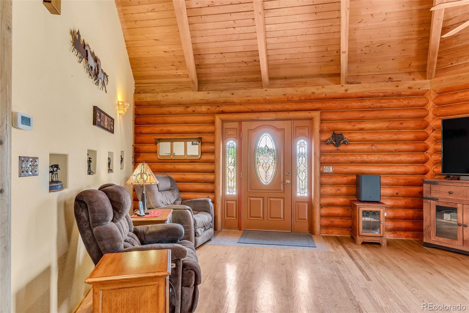 1747 Newton Road Pueblo, CO 81005 - Photo 6 of 40 a view of a livingroom with furniture and natural light