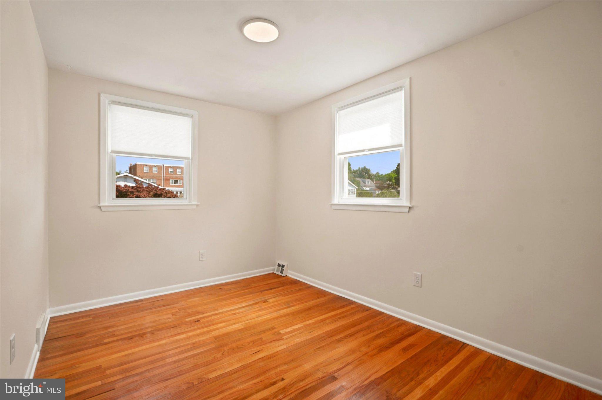 668 Renz Street Philadelphia, PA 19128 - Photo 16 of 25 Bright and airy room with hardwood floors.