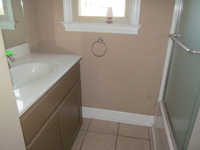 584 Oak Grove Road Goodspring, TN 38460 - Photo 8 of 12 a bathroom with a sink and mirror